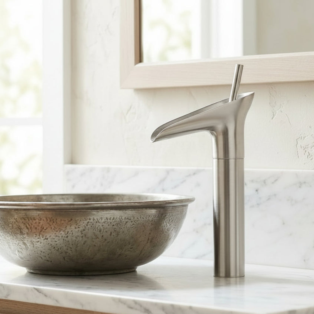 Lagomel single-hole waterfall vessel sink faucet, set in a Modern/Contemporary bathroom