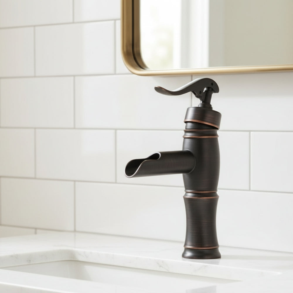 Lagomel waterfall single-hole bathroom faucet in oil-rubbed bronze, set in a Traditional/Classic/Vintage/Retro/Art Deco bathroom