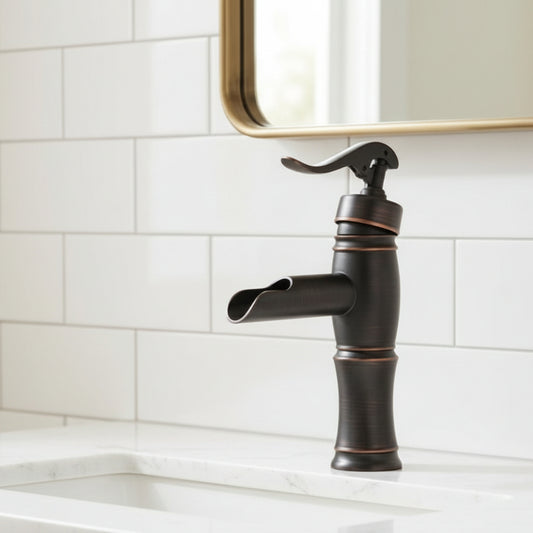 Lagomel waterfall single-hole bathroom faucet in oil-rubbed bronze, set in a Traditional/Classic/Vintage/Retro/Art Deco bathroom