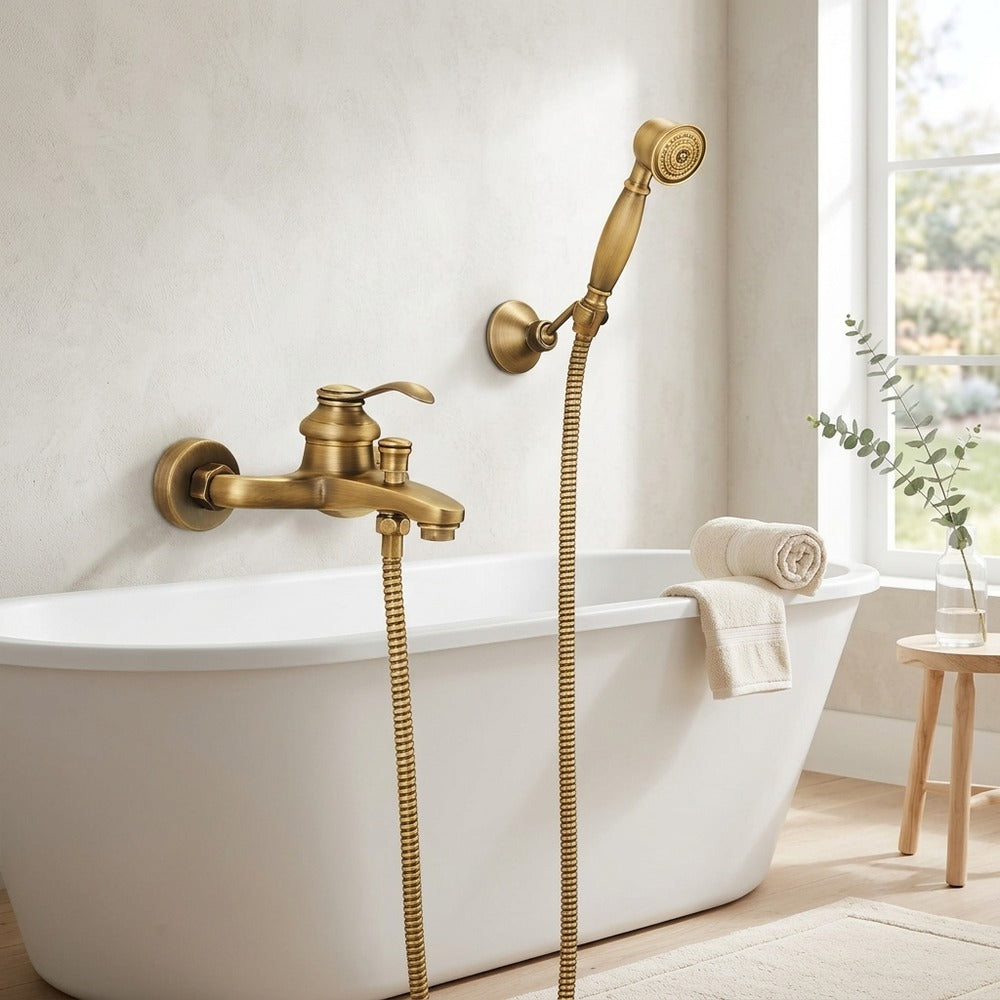 Lagomel single-handle wall-mount tub filler in antique brass, set in a Traditional/Classic/Vintage/Retro bathroom