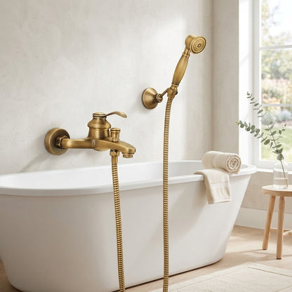 Lagomel single-handle wall-mount tub filler in antique brass, set in a Traditional/Classic/Vintage/Retro bathroom