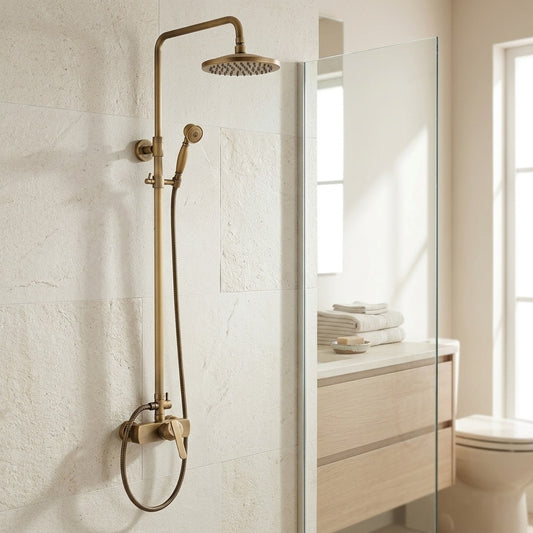 Lagomel wall-mounted single-handle complete shower system in antique brass, set in a Traditional/Classic bathroom