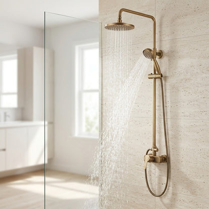 Lagomel wall-mounted complete shower system in antique brass, set in a Traditional/Classic/Vintage/Retro bathroom