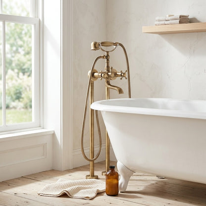 Lagomel wall-mount tub filler in antique brass, set in a Traditional/Classic/Vintage/Retro bathroom