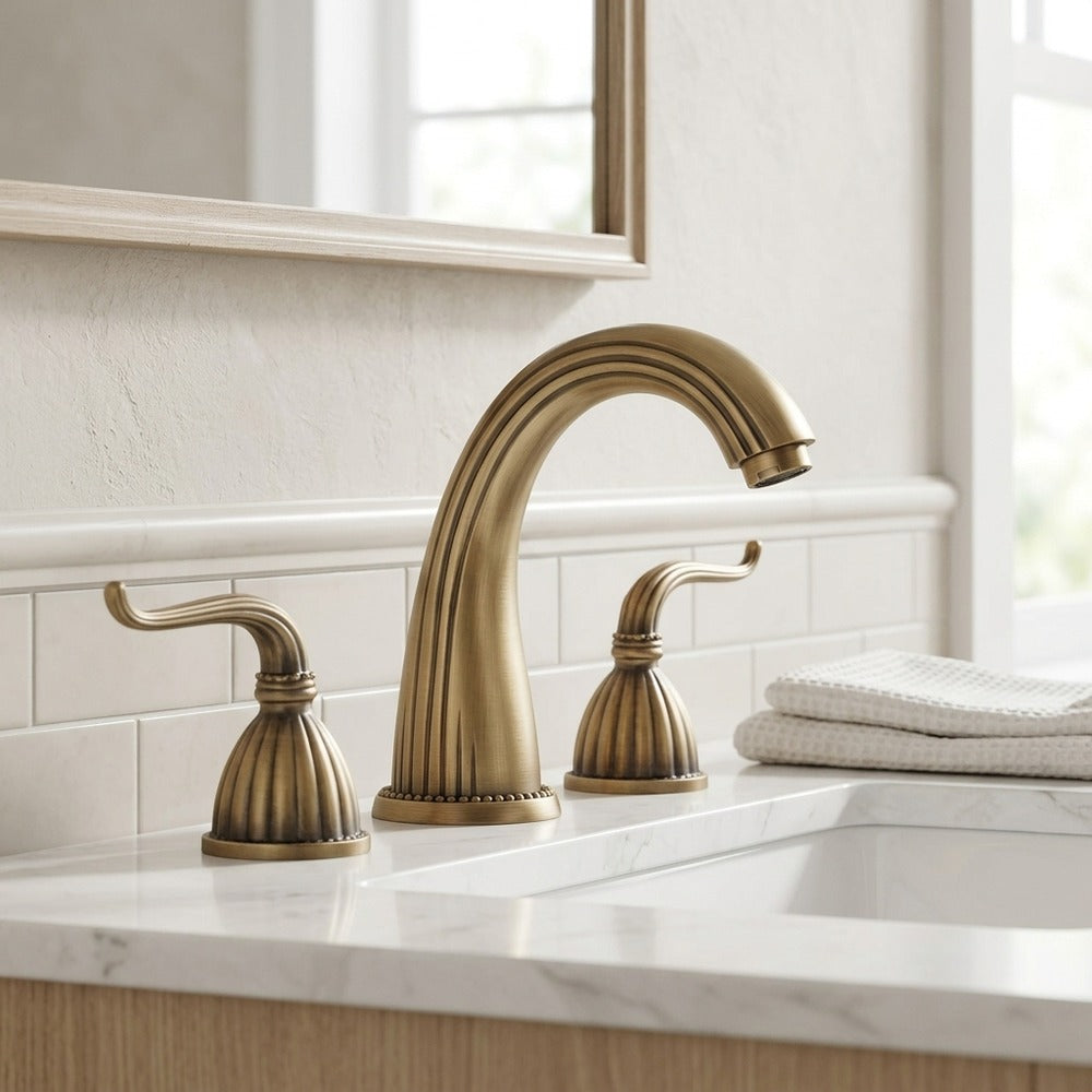 Lagomel two-handle widespread bathroom faucet in antique brass, oil-rubbed bronze, set in a Vintage/Retro bathroom