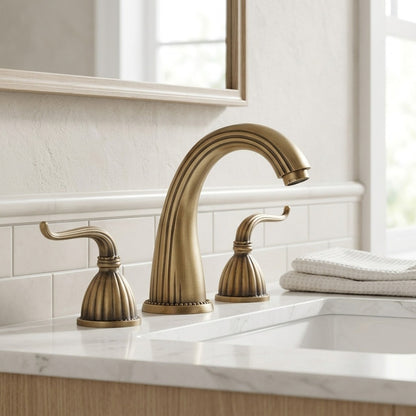 Lagomel two-handle widespread bathroom faucet in antique brass, oil-rubbed bronze, set in a Vintage/Retro bathroom
