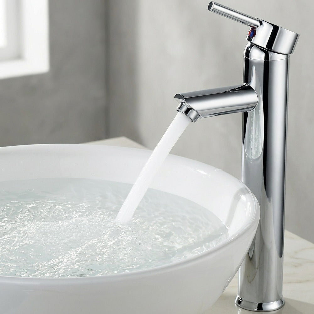 Lagomel single-hole single-handle vessel sink faucet in chrome, set in a Contemporary bathroom