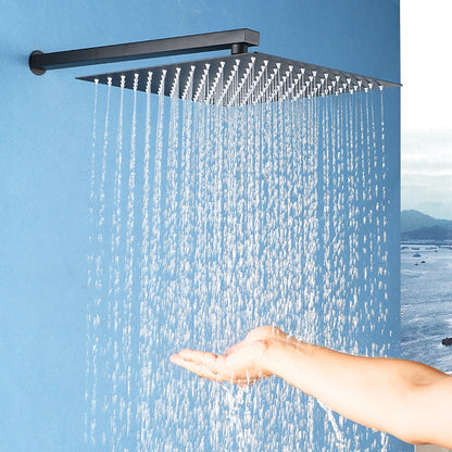 Lagomel rain shower head in matte black, set in a Contemporary bathroom