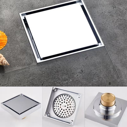Lagomel square floor drain in chrome, polished gold, brushed gold, matte black, set in a Contemporary bathroom