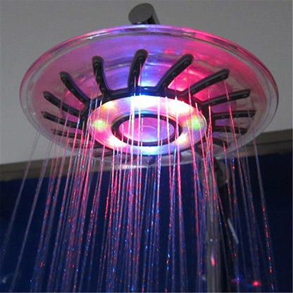 Lagomel rain shower head in chrome, set in a Contemporary bathroom